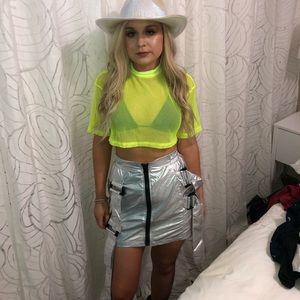 Fashion Nova skirt and neon mesh crop top